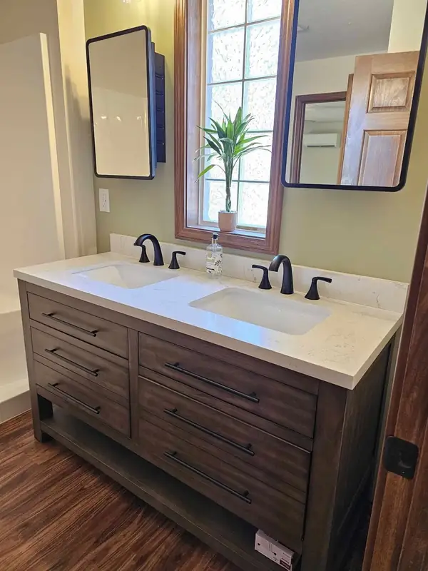 Furniture-style walnut vanity with an undermount sink