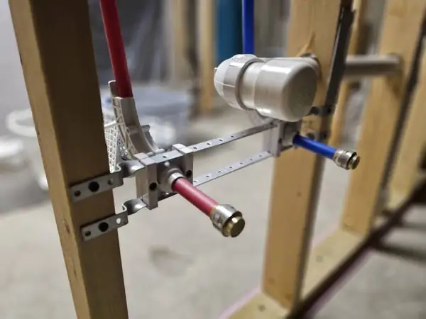 New PEX supply lines roughed into open stud bays
