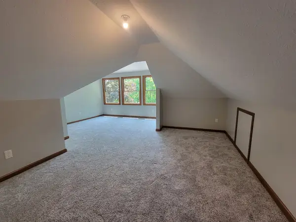 Finished bonus room with dormer windows and new carpet