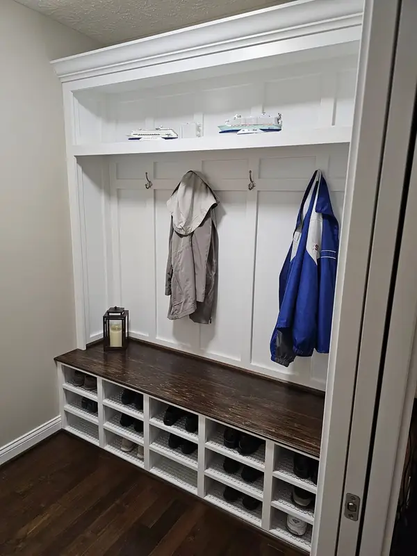 Built-in mudroom lockers with bench seating and cubbies